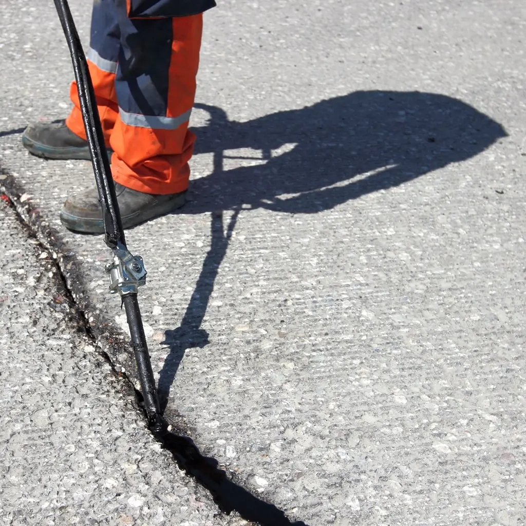 Experts in Preventing Water and Debris from Penetrating Cracks in Asphalt Surfaces: